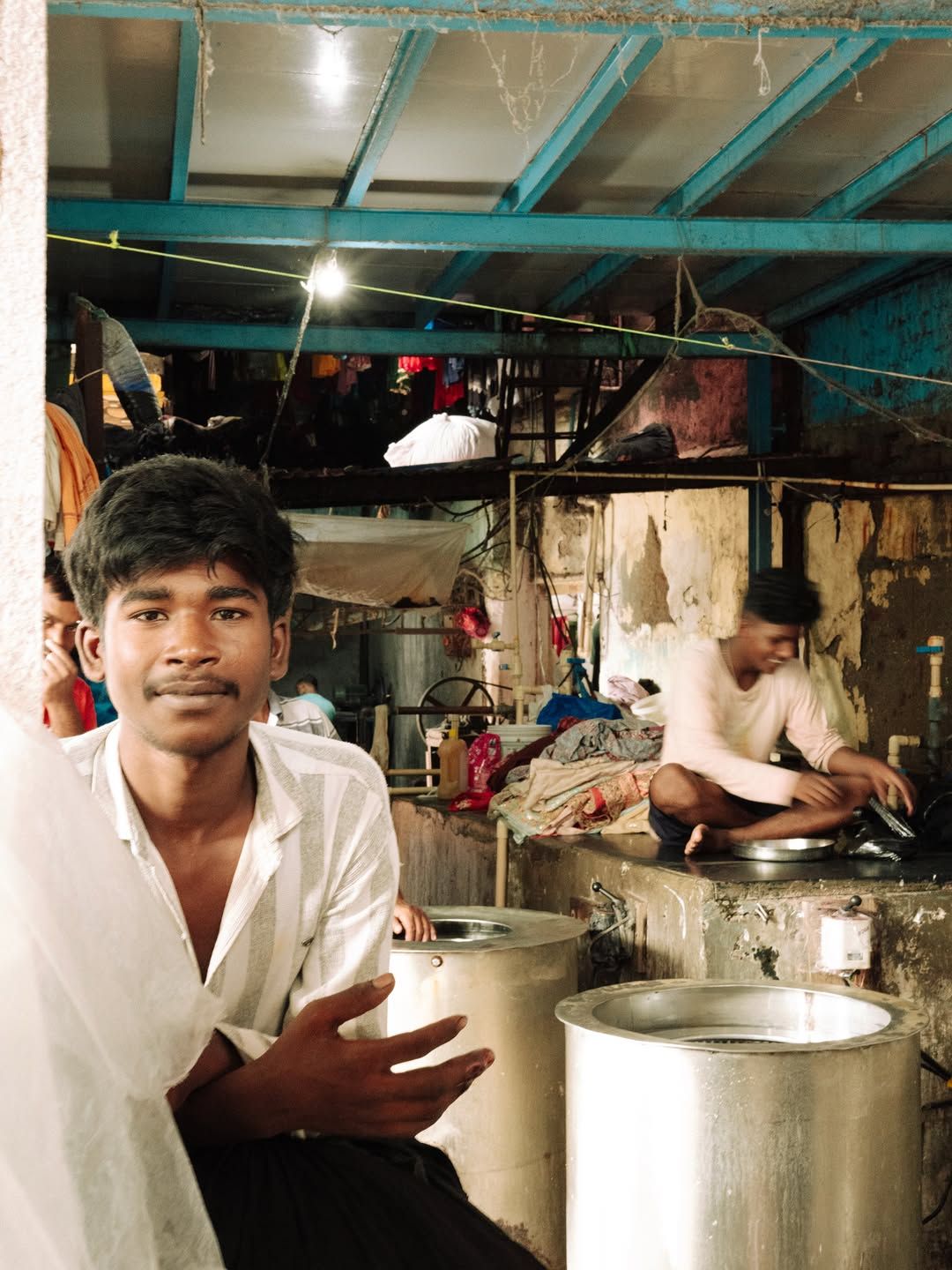 A young washerman at work